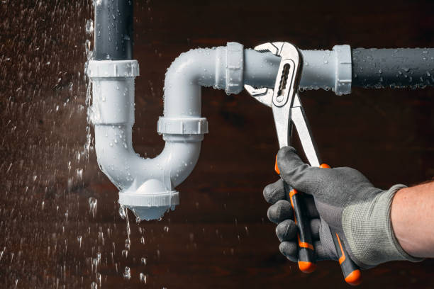 Professional Drain Cleaning technician working in Campbell, FL